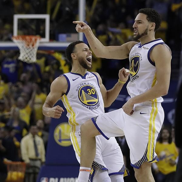 Golden State Warriors' Stephen Curry, left, and Klay Thompson celebrate during the second half of Game 5 of a second-round NBA basketball playoff series against the Houston Rockets Wednesday, May 8, 2019, in Oakland, Calif. (AP Photo/Ben Margot)