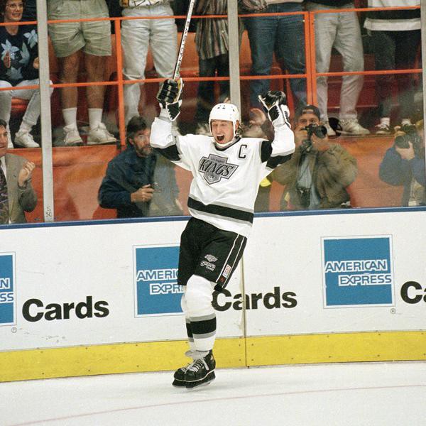 Wayne Gretzky and fans celebrate after he scored his NHL career record-setting 802nd goal against the Vancouver Canucks, on March 23, 1994, at the Forum in Inglewood, California.  (AP Photo/Eric Draper)