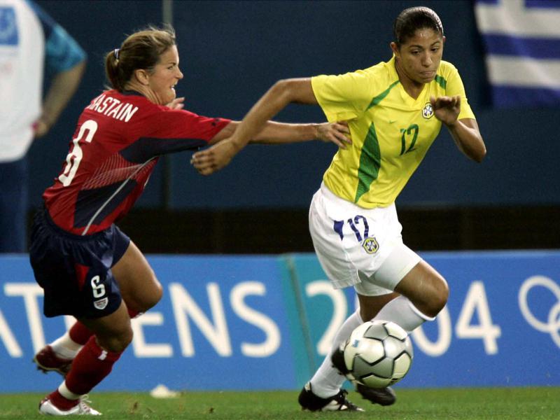 Brazil's Cristiane, right, battles against Brandi Chastain from the United States during the gold-medal women's soccer game at 2004 Summer Olympics in Athens, Greece.