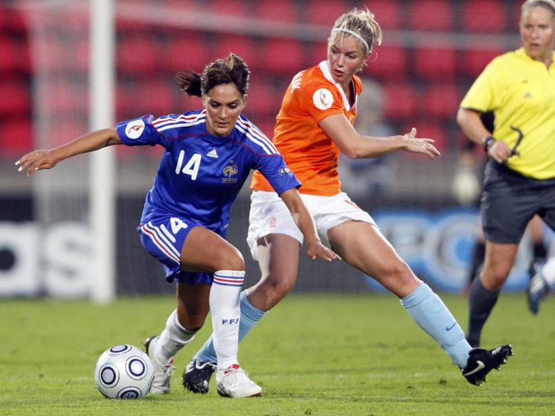 France's Louisa Necib, left, in a 2009 Women's European Championship quarterfinal match against the Netherlands in Tampere, Finland.